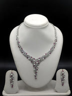 American diamond V shape necklace set with red stones and pearl accents for women