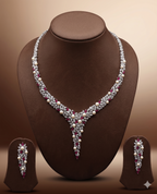 American diamond V shape necklace set with red stones and pearl accents for women
