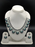 American diamond fan design necklace set with teal and navy blue stones for women