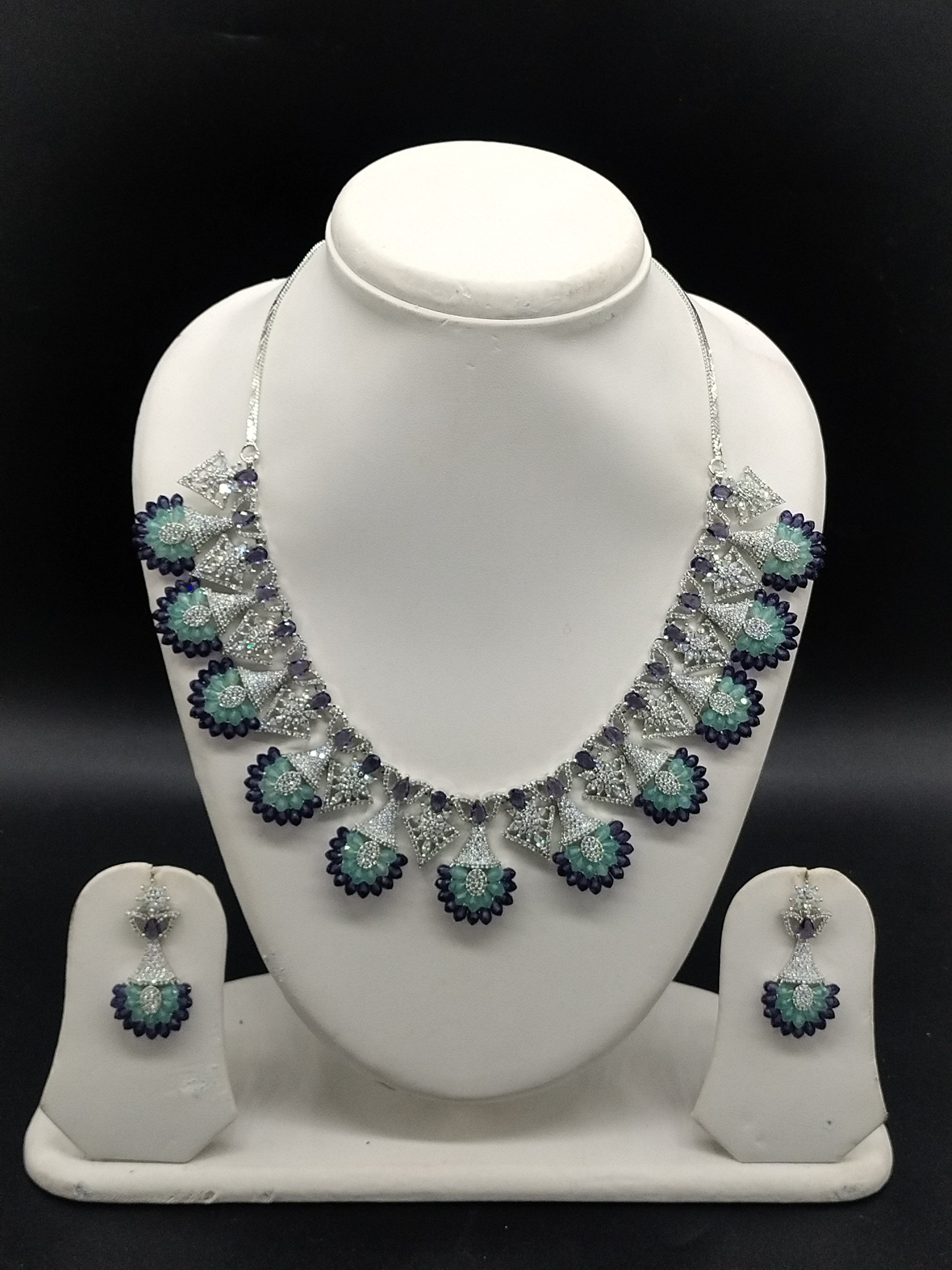 American diamond fan design necklace set with teal and navy blue stones for women