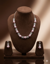 American diamond pink pearl necklace set with floral design and matching earrings for women