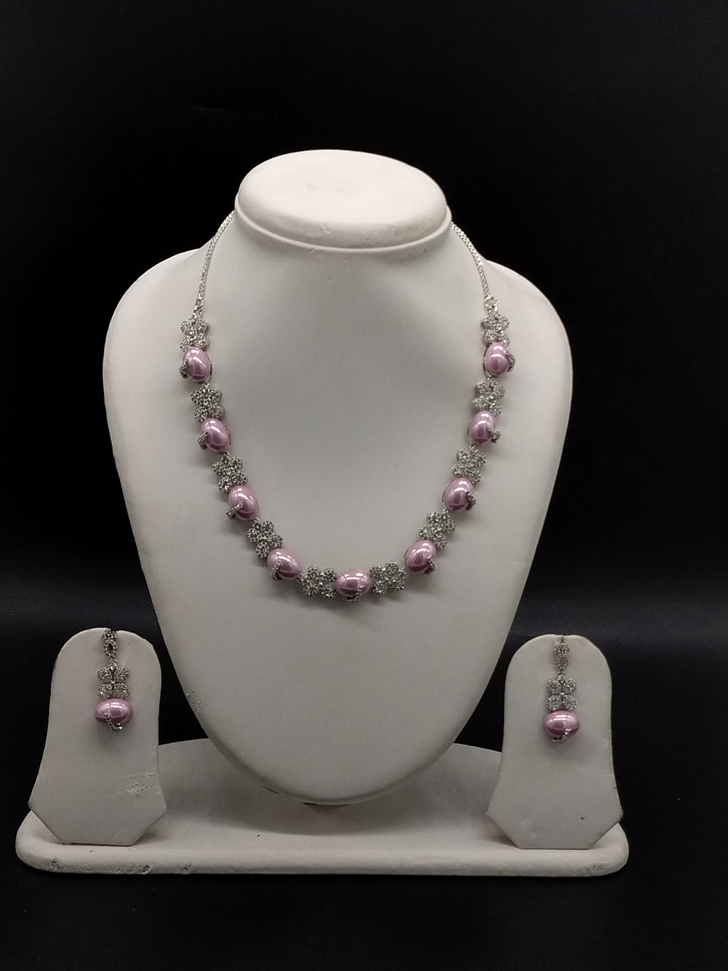 American diamond pink pearl necklace set with floral design and matching earrings for women