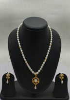 One line freshwater pearl necklace and earrings set with sculpted teardrop pendant and gold-accented pearls