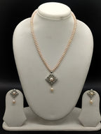 Blush Grace freshwater pearl pendant necklace set with pink flat pearls and silver designer pendant with pearl drop