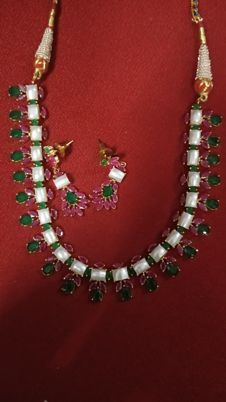 Buy traditional kundan choker necklace set with red green stones and matching earrings