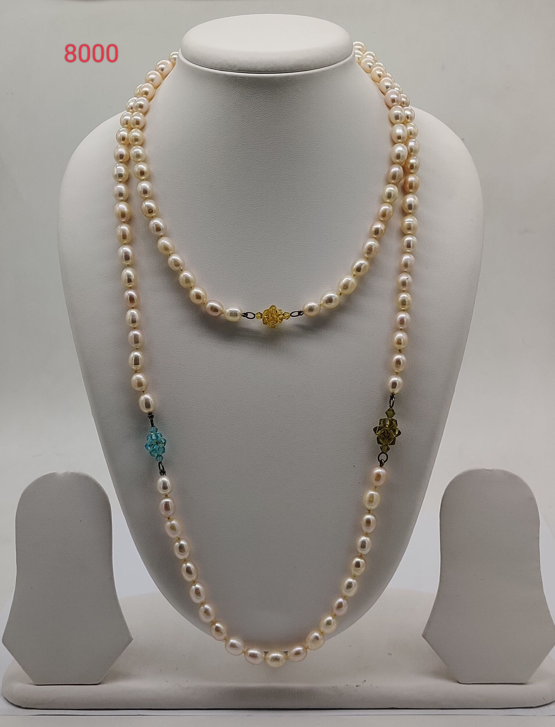 Charm Bloom freshwater pearl necklace with off white pearls and colourful beads in multi strand layered design