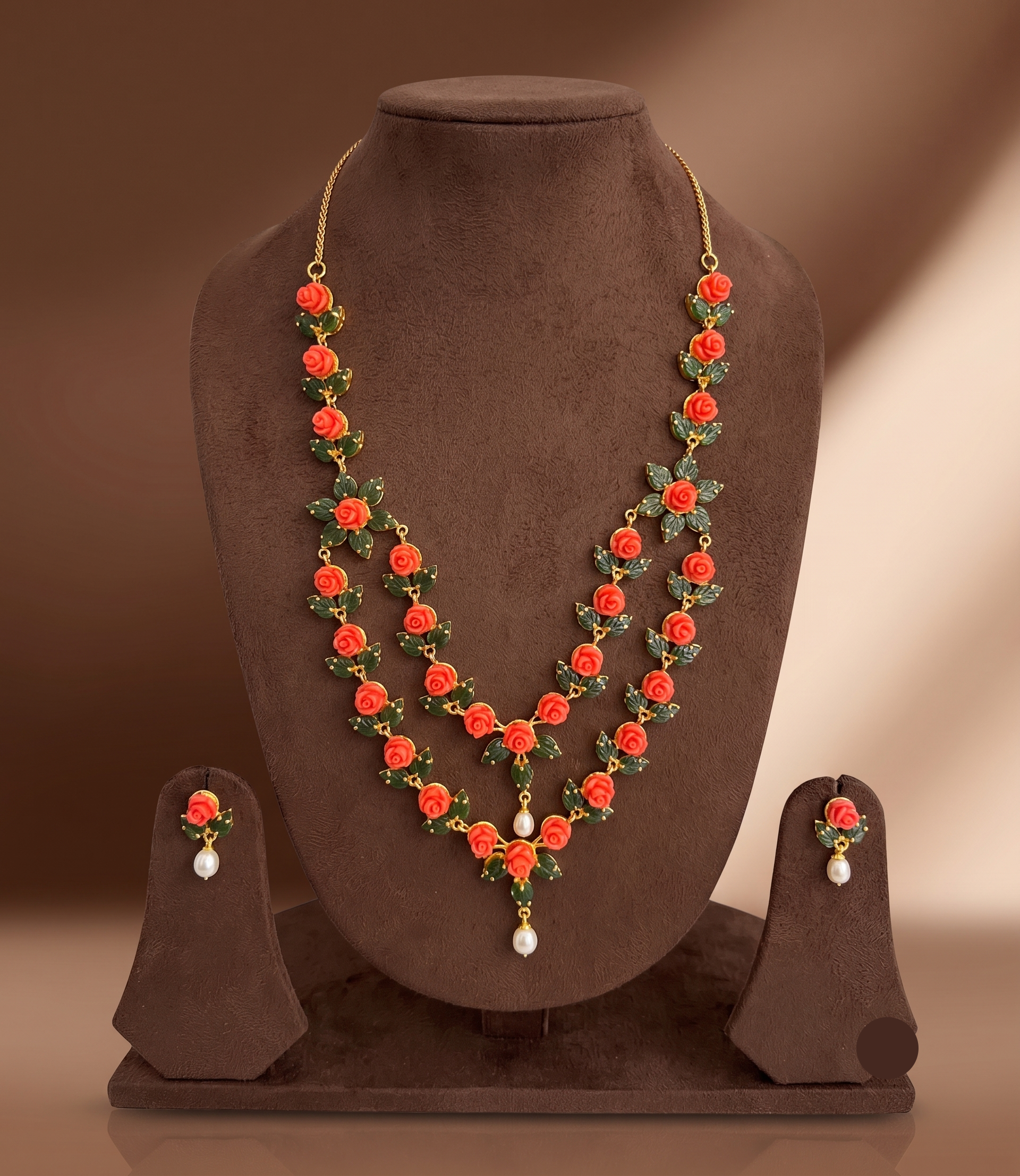 Coral Rose Elegance two line necklace set with hand-carved coral roses and freshwater pearl drops.
