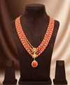 Coral Royale Taiwan coral and Mother of Pearl five layer necklace with floral pendant.