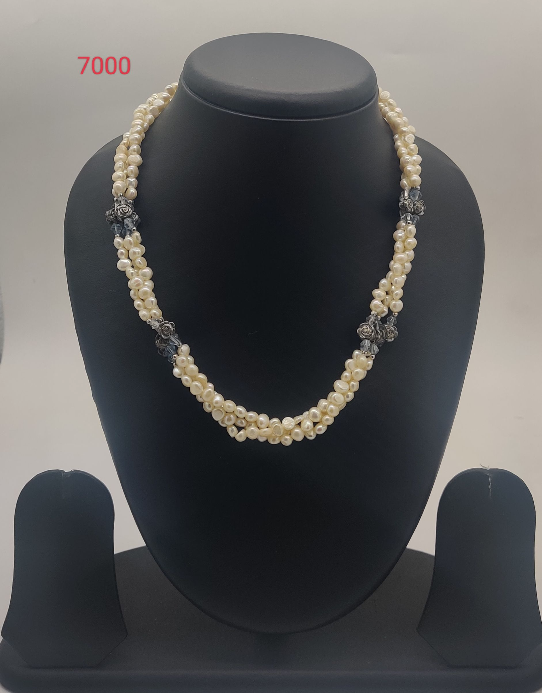 Designer Noir Floral Symphony freshwater pearl necklace set with peach irregular pearls and dark metallic floral accents