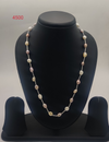 Discover Petal Glow Strand freshwater pearl necklace set with white cream and pink irregular pearls with metallic tubular beads