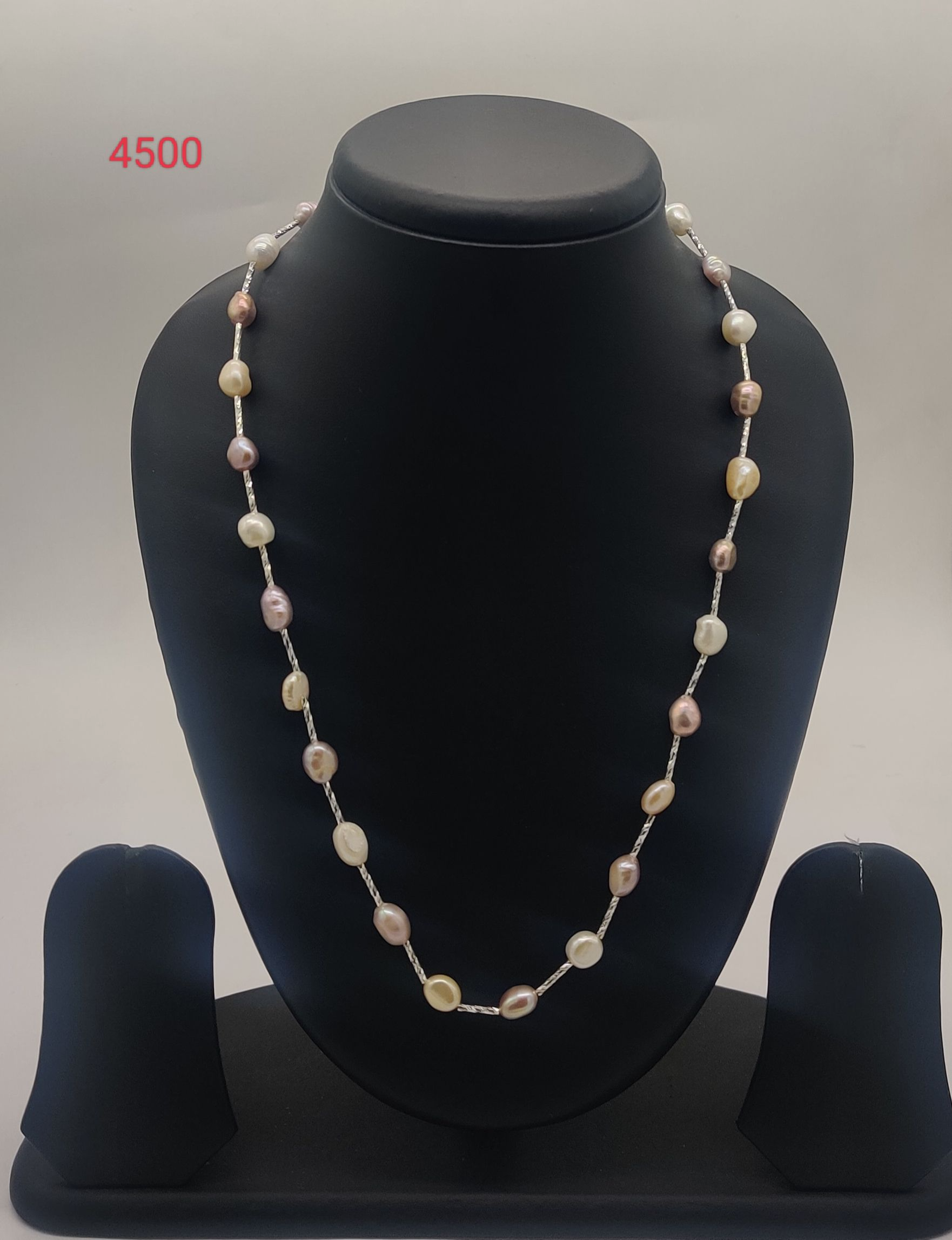 Discover Petal Glow Strand freshwater pearl necklace set with white cream and pink irregular pearls with metallic tubular beads