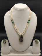 Emerald Spiral freshwater pearl pendant necklace set with two line white pearls and green spiral pendant