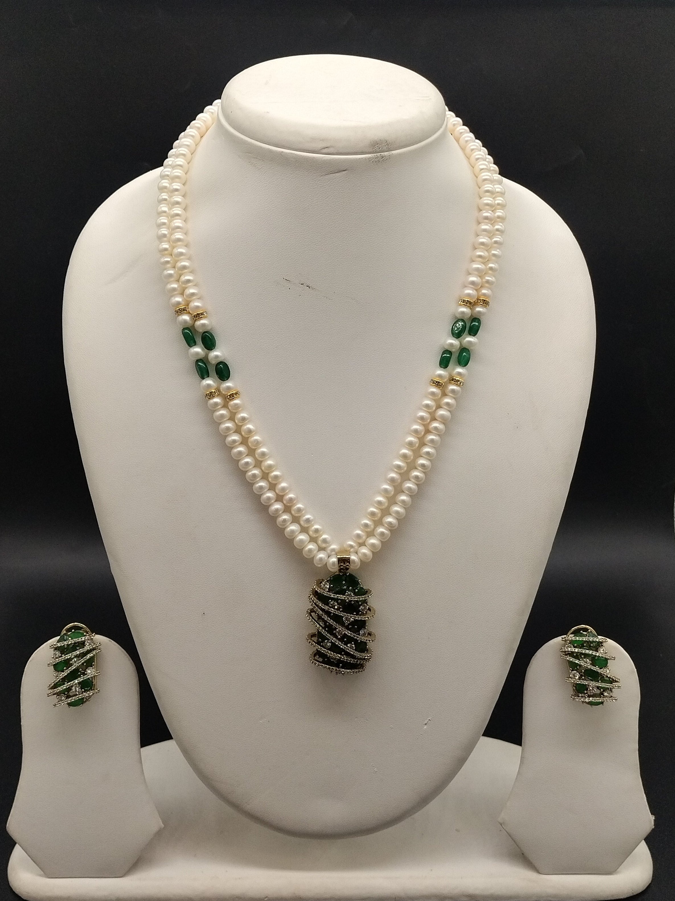 Emerald Spiral freshwater pearl pendant necklace set with two line white pearls and green spiral pendant