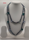 Forest Mist Cascade freshwater pearl necklace with black oval pearls and green blue gemstone accents in layered design