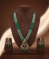 Freshwater pearl and green beads long haram set with peacock pendant and matching earrings.