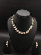 Freshwater pearl choker set with red, green, and white stone floral clusters and matching drop earrings.