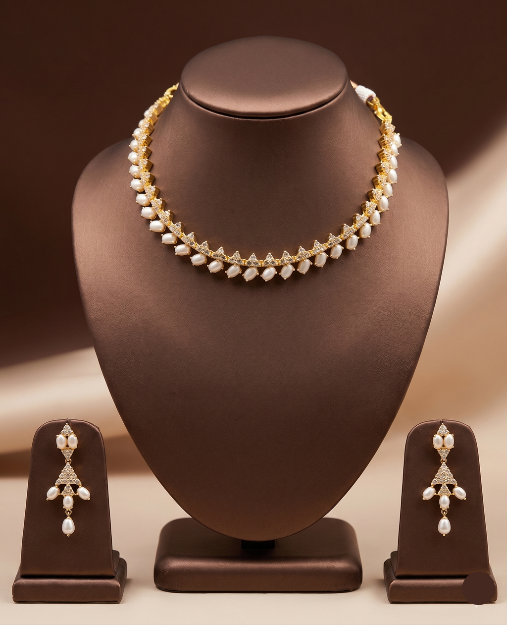 Freshwater pearl choker set with white AD stones, pearl fringe detailing, and matching drop earrings.