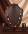 Freshwater pearl long haram set with multi-colour stone detailing and matching drop earrings.