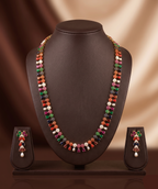 Freshwater pearl long haram set with multi-colour stone detailing and matching drop earrings.