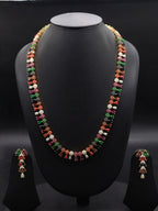Freshwater pearl long haram set with multi-colour stone detailing and matching drop earrings.