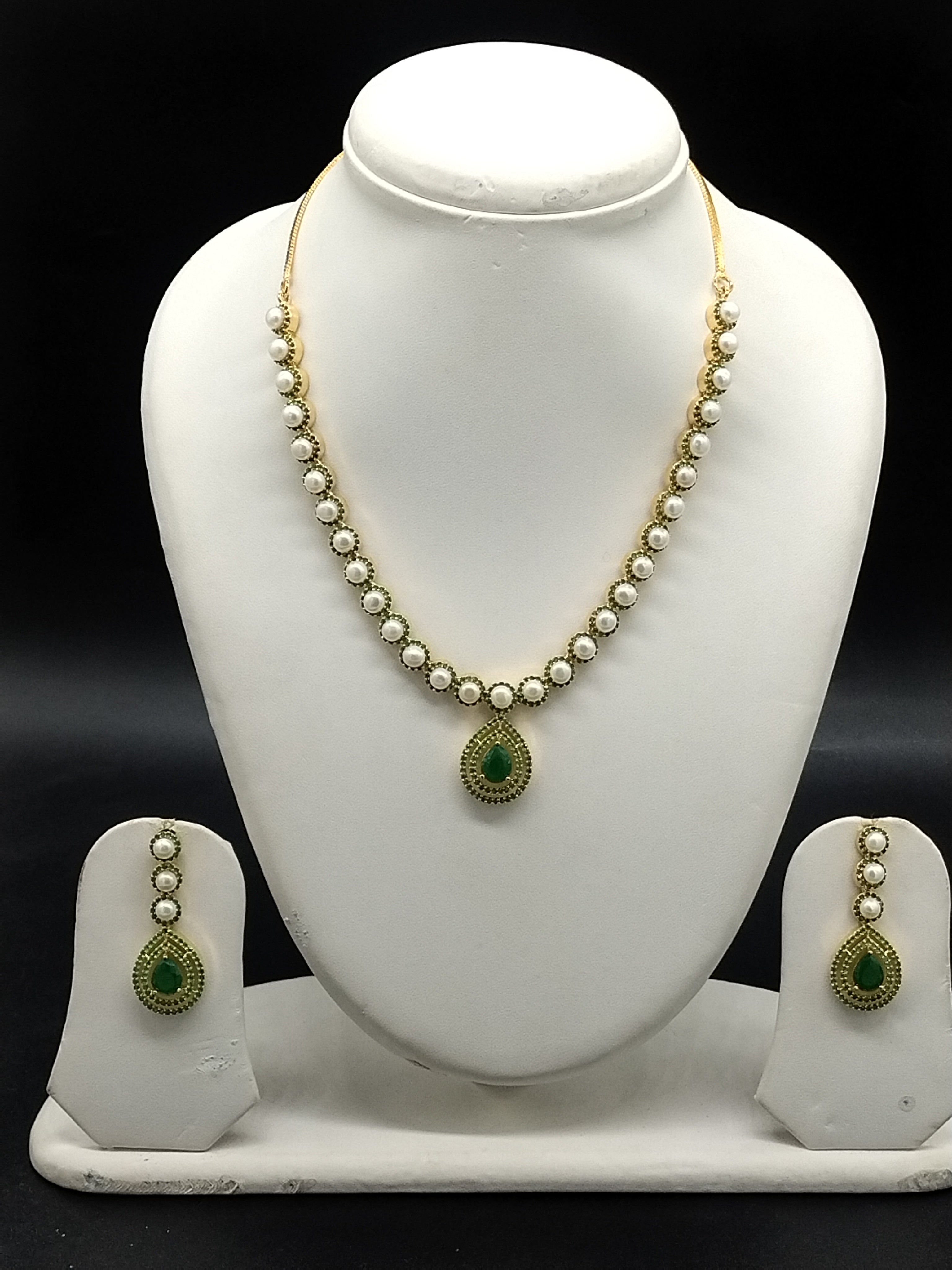 Freshwater pearl necklace set with emerald green teardrop pendant and matching drop earrings