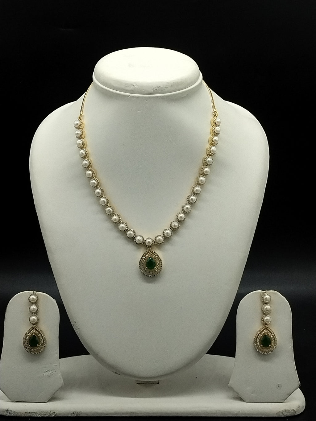 Freshwater pearl necklace set with emerald green teardrop pendant, white CZ halo, and matching drop earrings