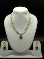 Freshwater pearl necklace set with emerald green teardrop pendant, white CZ halo, and matching drop earrings