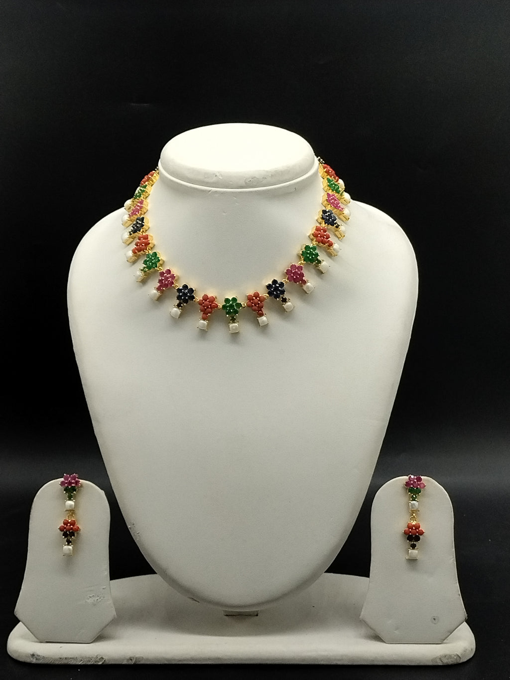 Freshwater pearl necklace set with multicolour stones, floral design, pearl drops, and matching earrings.