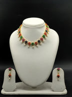 Freshwater pearl necklace set with multicolour stones, floral design, pearl drops, and matching earrings.
