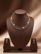Freshwater pearl necklace set with multicolour stones, sparkling CZ floral motifs, and matching drop earrings.