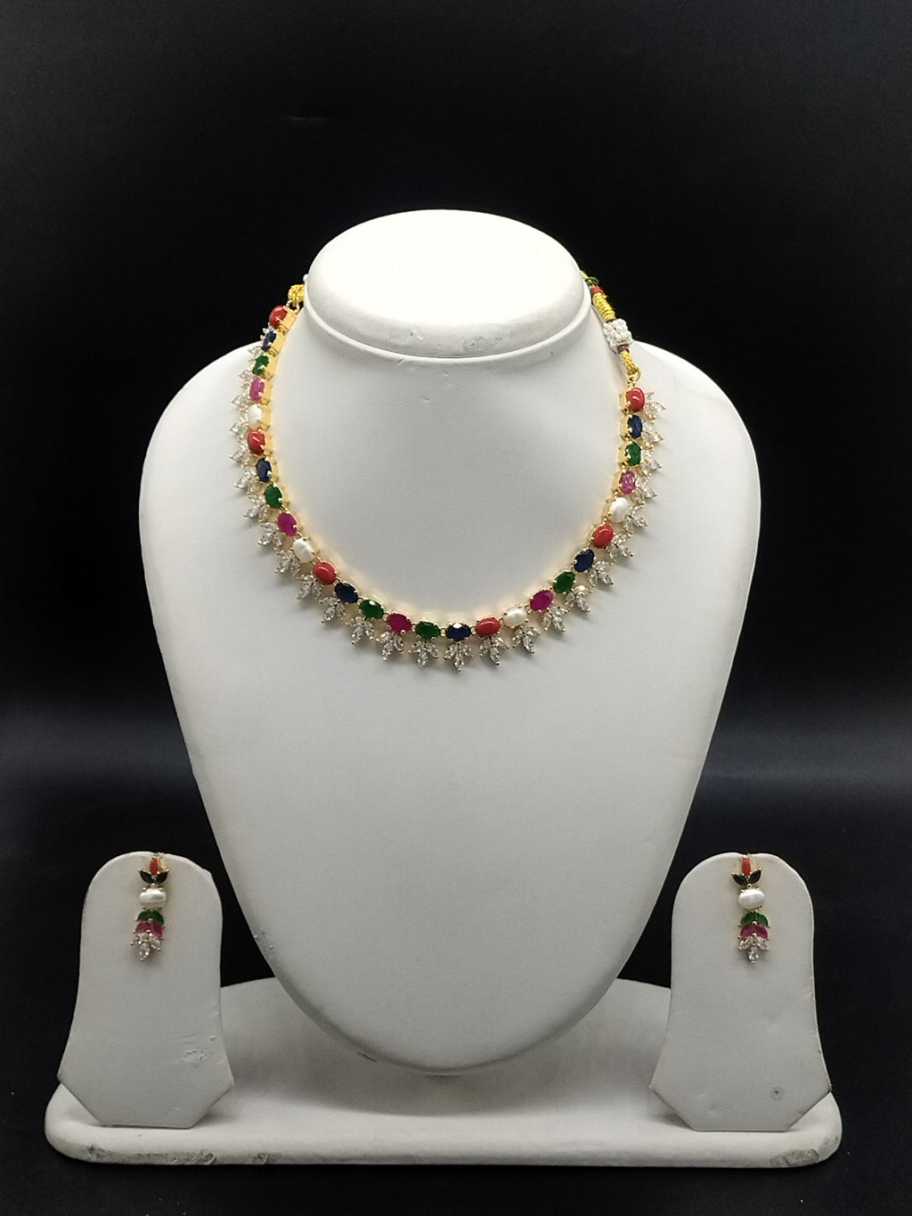 Freshwater pearl necklace set with multicolour stones, sparkling CZ floral motifs, and matching drop earrings.