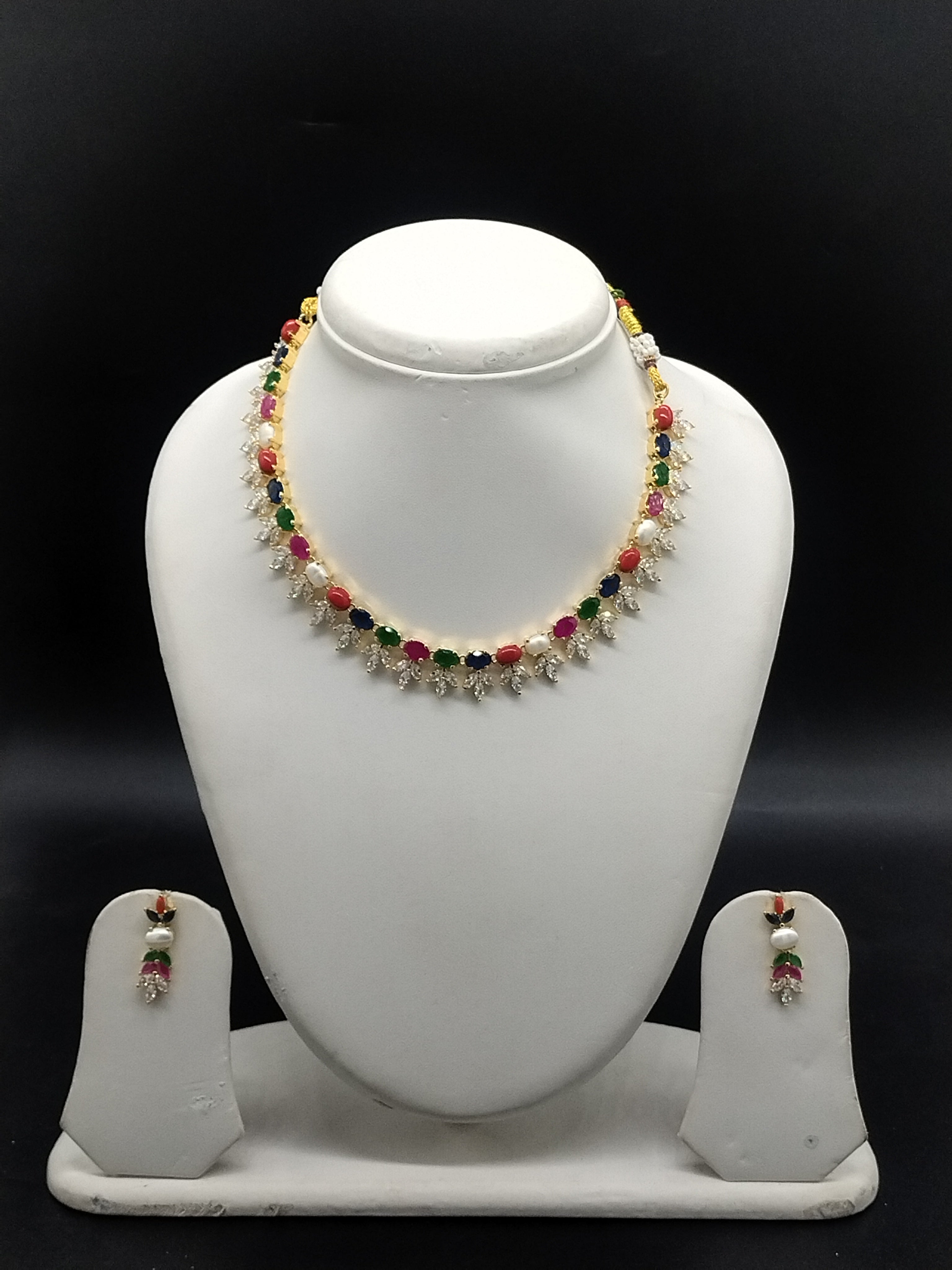 Freshwater pearl necklace set with multicolour stones, sparkling CZ floral motifs, and matching drop earrings.