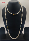 Garden Whispers Strand freshwater pearl necklace with white oval pearls and colorful floral beads in multi strand design