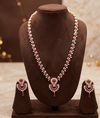 The Crimson Chevron: Rice Pearl Long Haar with Ruby Chandbali Pendant Set