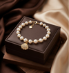 Oval White Freshwater Pearl Gold-Tone Shell Charm Bracelet