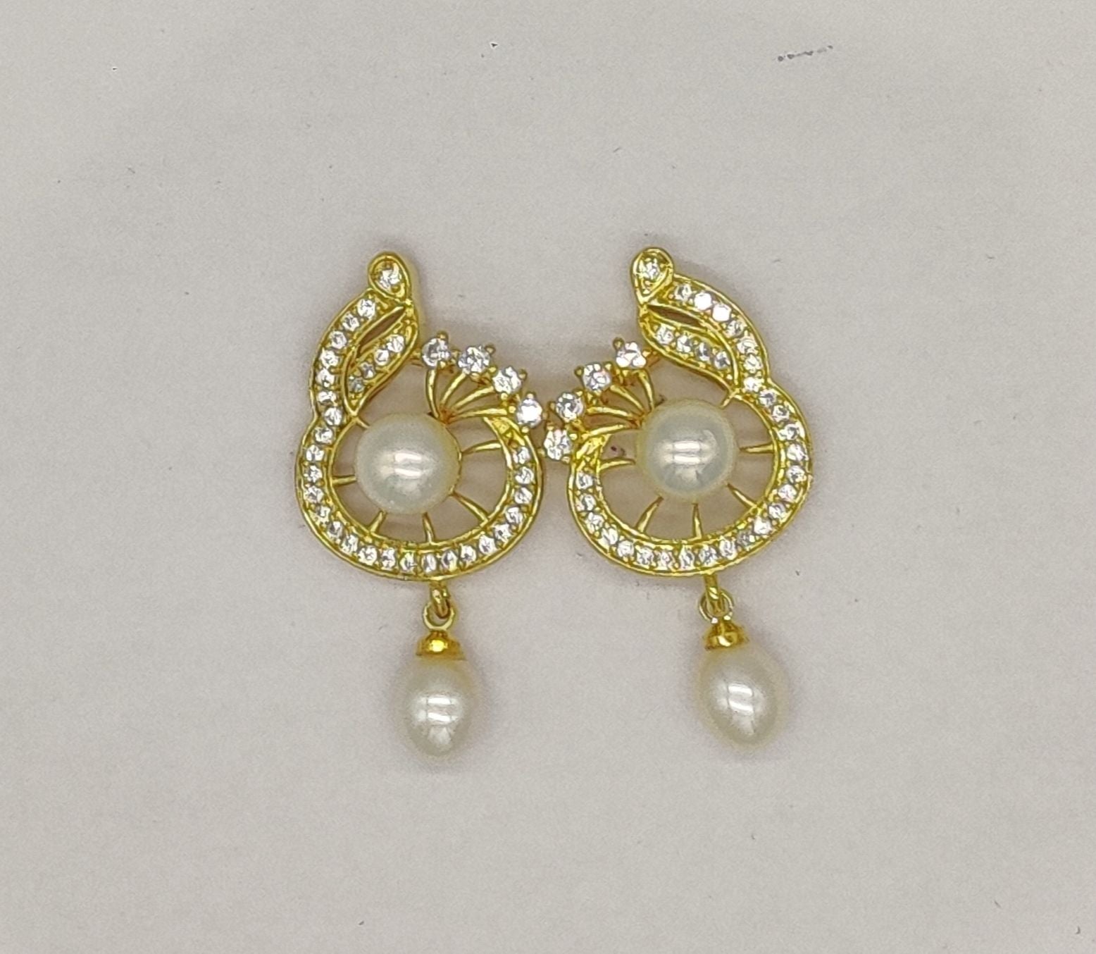 Gold-tone swirl halo pearl earrings for women
