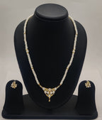 One line freshwater pearl necklace and earrings set with gold-toned pendant and matching stud earrings