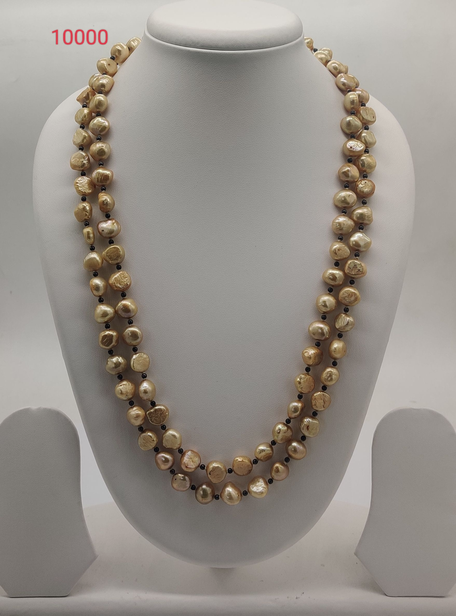 Golden Twilight freshwater pearl necklace with golden pearls and dark beads in double strand layered design