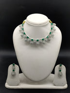 Green and white American Diamond necklace set with emerald-inspired stones and matching drop earrings