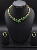 Green and white stone designer choker set with asymmetrical wrap-around design and matching stud earrings.
