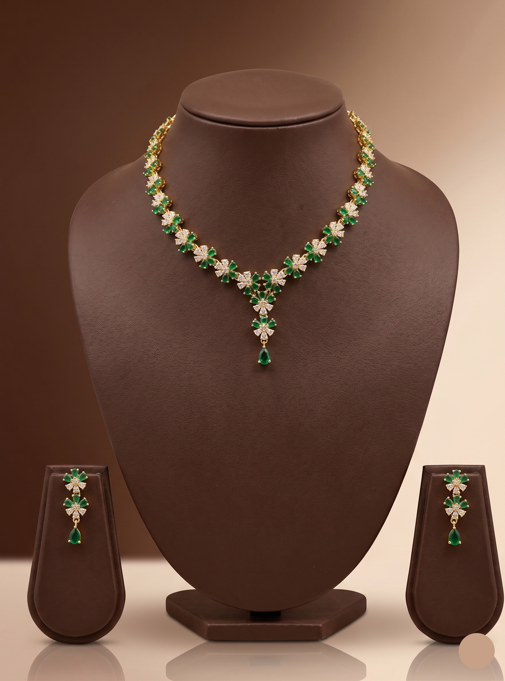 Green and white stone necklace set with floral motifs and matching drop earrings.