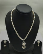 One line freshwater pearl necklace and earrings set with celestial bloom pendant and oval pearls