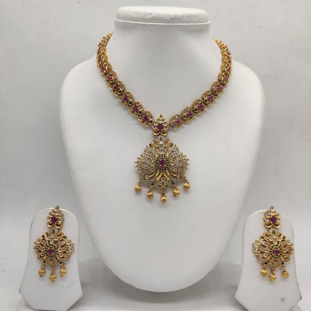 Imperial multicolour CZ necklace set with ornate pendant and matching drop earrings.
