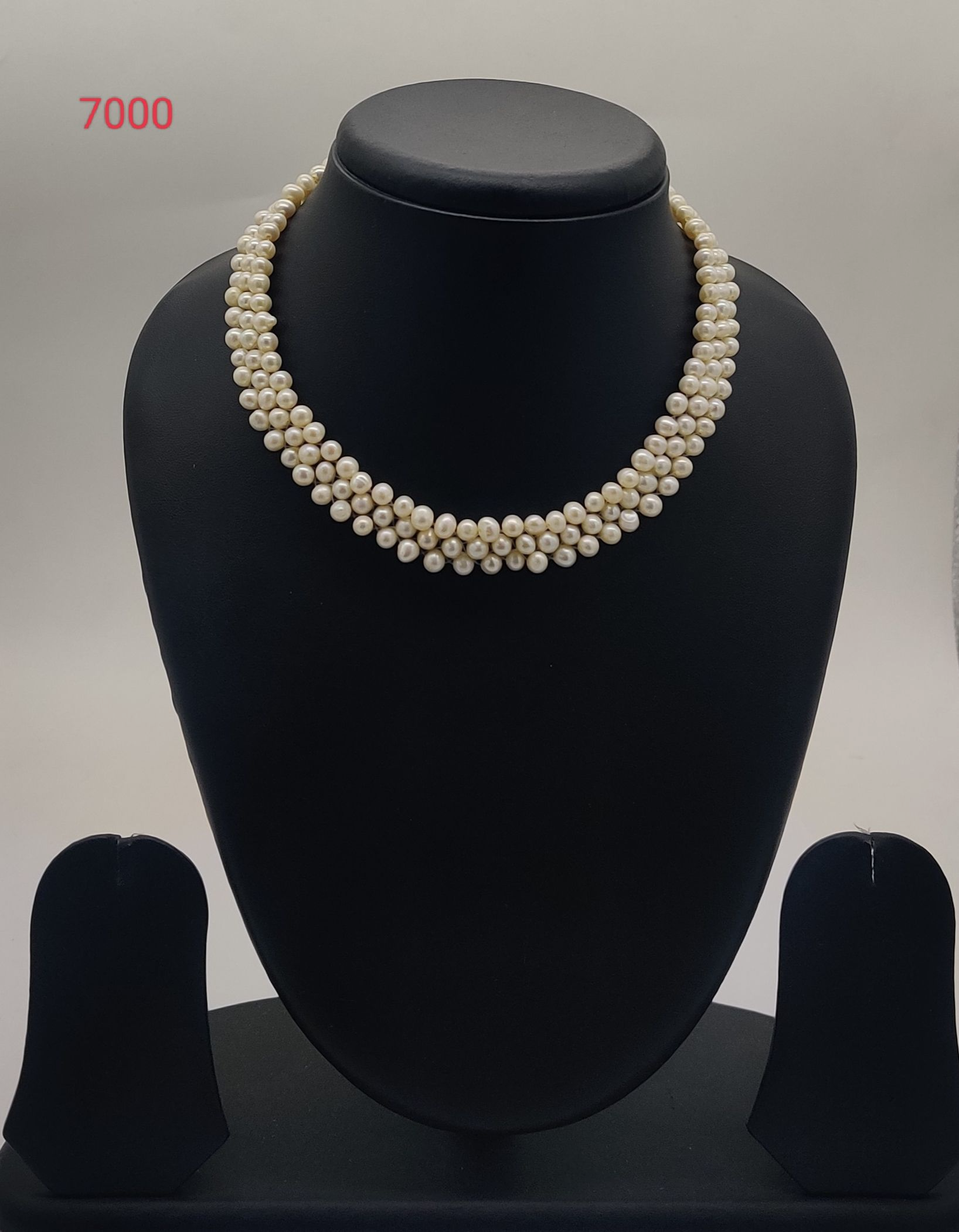 Ivory Cascade Braid freshwater pearl necklace set with braided round white freshwater pearls in multi-strand design