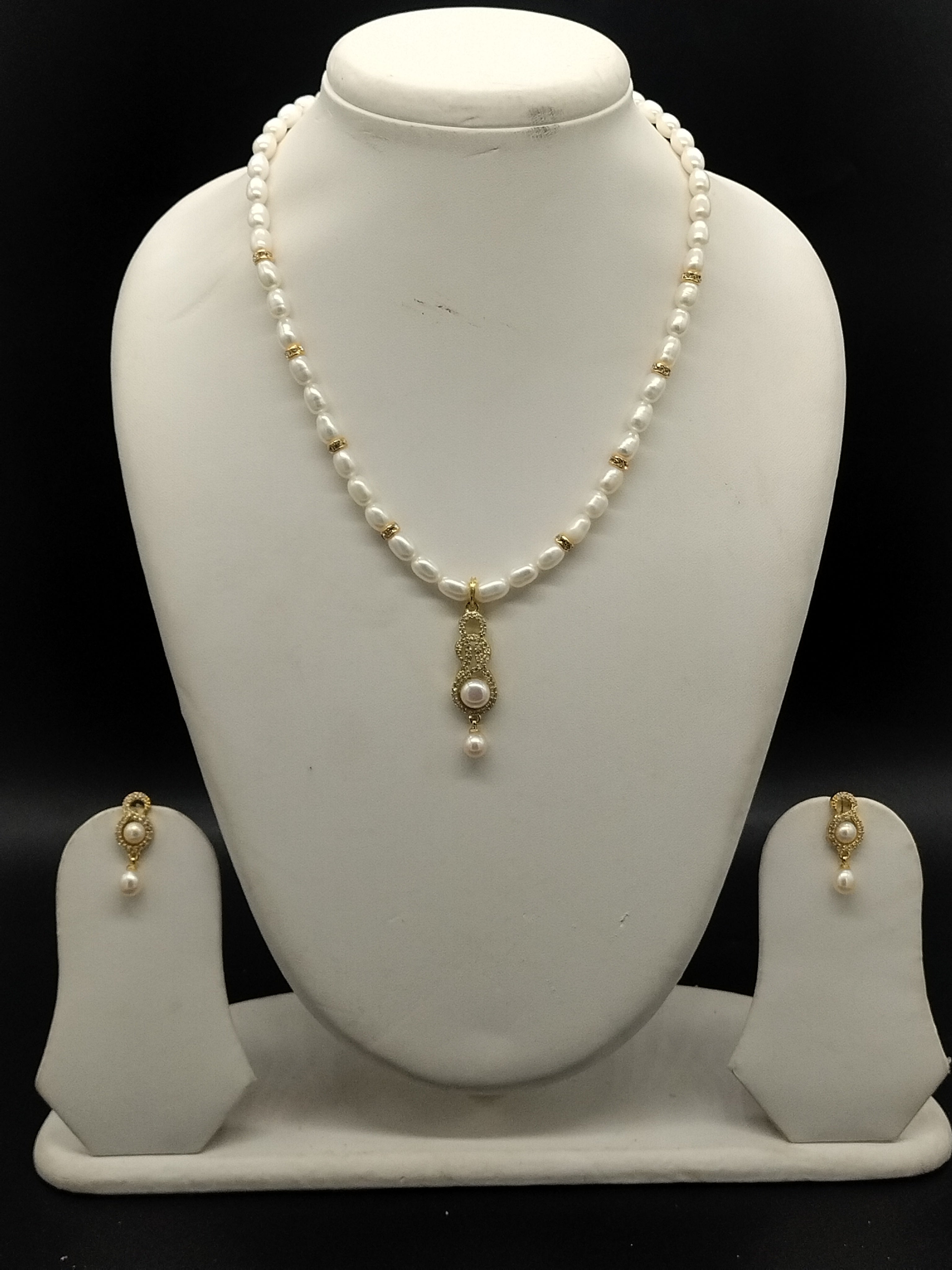 Ivory Elegance freshwater pearl pendant necklace set with white oval pearls and gold pendant with pearl drop