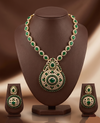 Long necklace set with emerald-inspired green stones, white American Diamond detailing, and matching chandelier earrings.