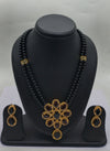 Midnight Blossom two-line black freshwater pearl pendant necklace and earrings set with floral black stone