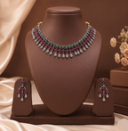 Multicolour American Diamond necklace set with pink and green stones and matching drop earrings.