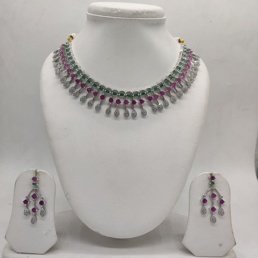 Multicolour American Diamond necklace set with pink and green stones and matching drop earrings.