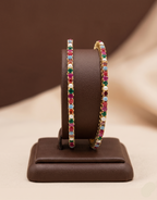 Navaratna gold tone gemstone pearl bangles with multicolour stones traditional jewellery
